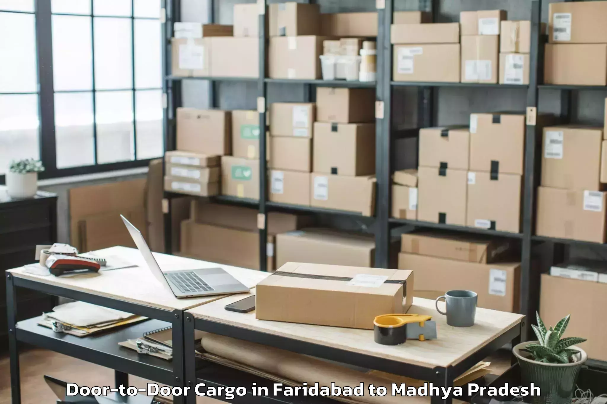 Efficient Faridabad to Goharganj Door To Door Cargo